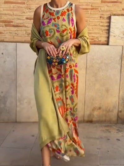 Elegant printed two-piece dress with cape